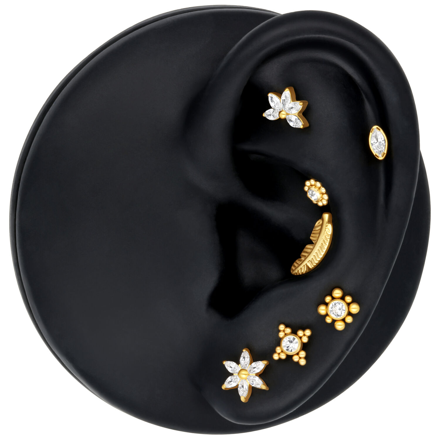 Embout Hibiscus en titane argent et or Embout en forme d'hibiscus argent et or sur un modèle d'oreille noir