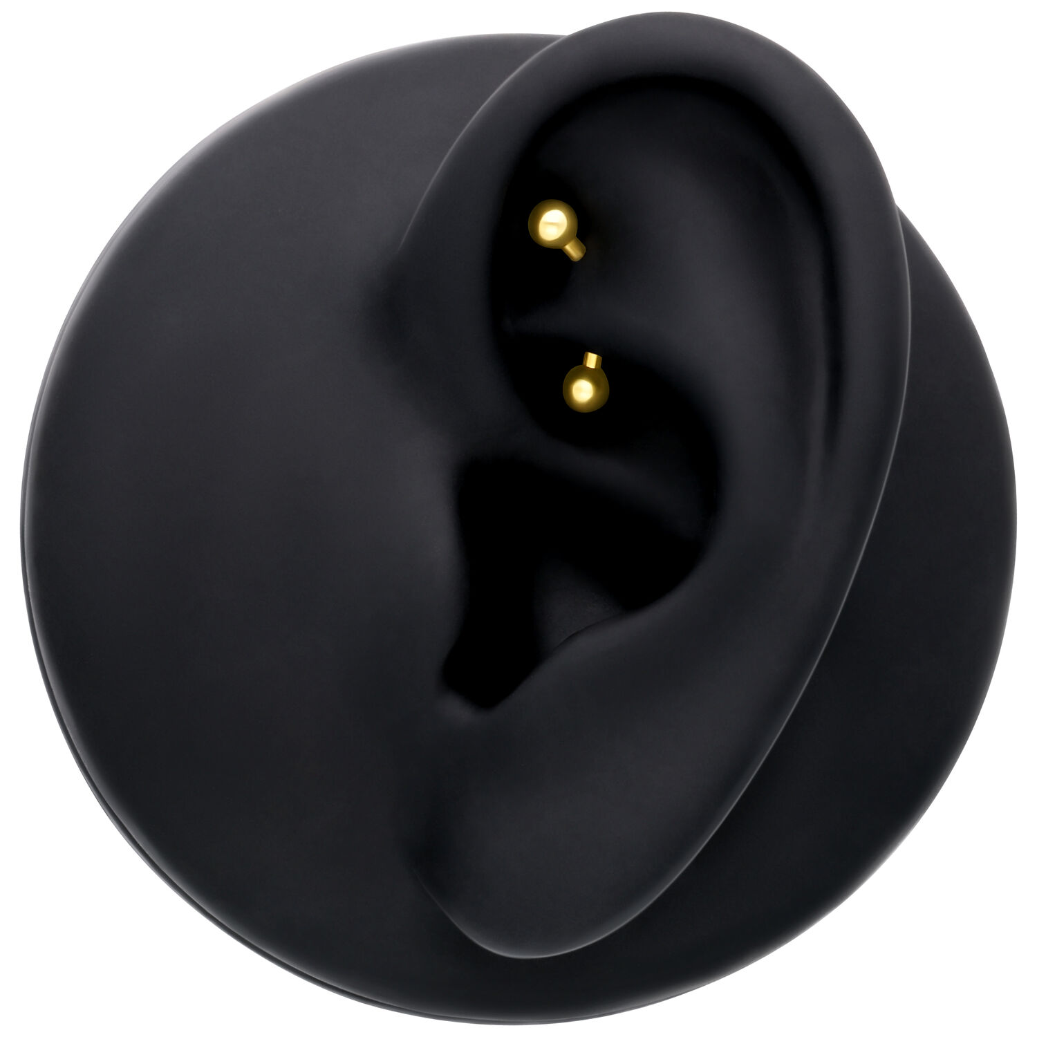Microbanane dorée dans un modèle d'oreille noir, design épuré