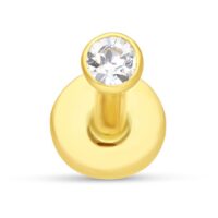 Labret en or 18K avec ornement cristallin Labret en or 18K avec pierre précieuse cristalline sur fond blanc