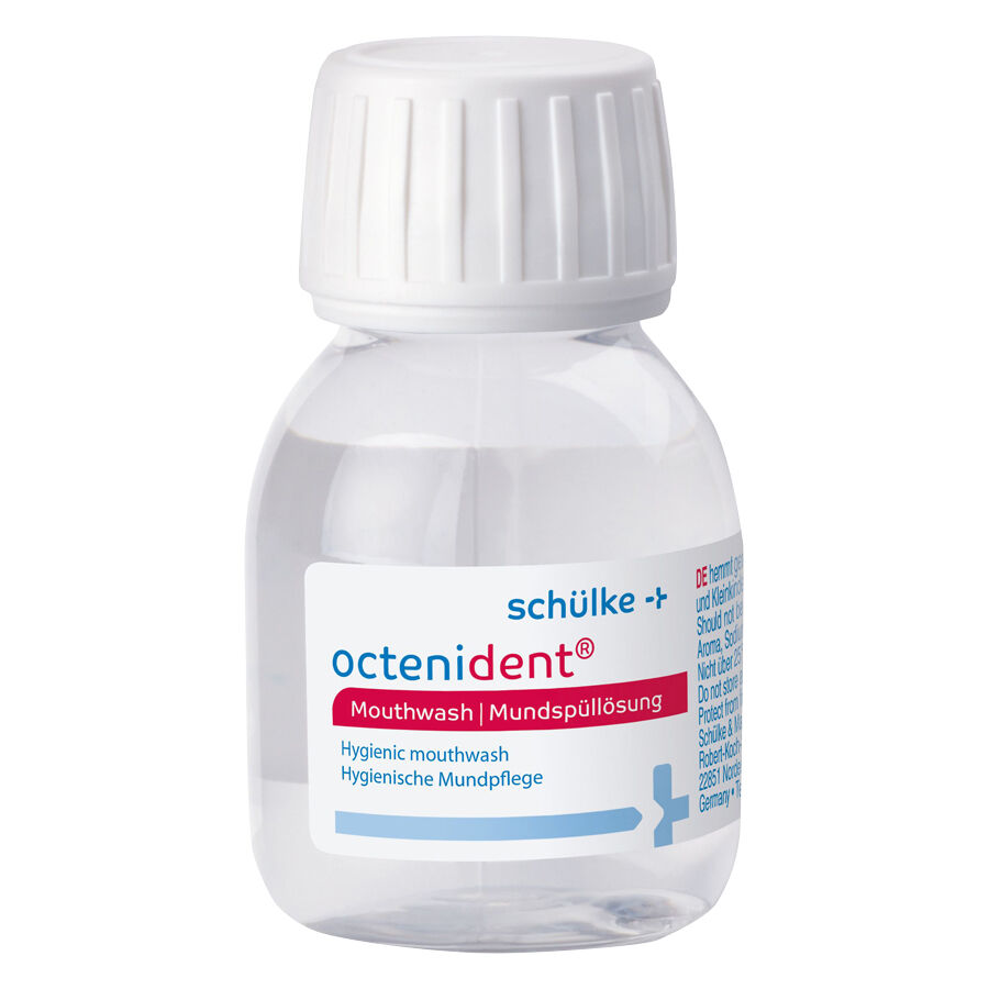 Octenident solution de rinçage buccal 60 ml bouteille Petite bouteille transparente de solution de rinçage buccal Octenident avec bouchon blanc sur fond blanc