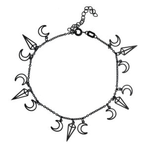 Bracelet de cheville noir en acier chirurgical avec pendentifs lune et cristal sur fond blanc