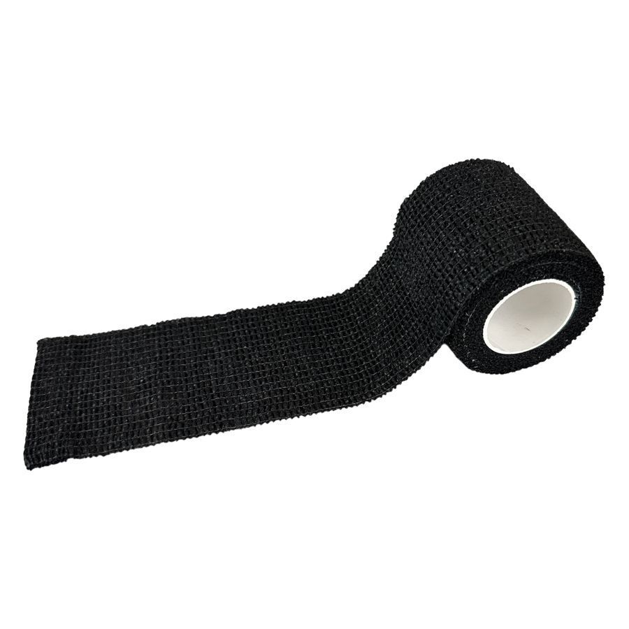 Bandage Grip noire, non tissée, partiellement déroulée, sur fond blanc
