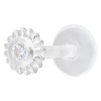 Labret piercing argenté avec pierre cristalline sur fond blanc