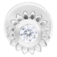 Labret argenté avec pierre claire en forme de fleur sur fond blanc