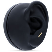 Barbell d'oreille en or 18K avec cristaux Barbell d'oreille en or 18K avec cinq cristaux clairs sur fond noir