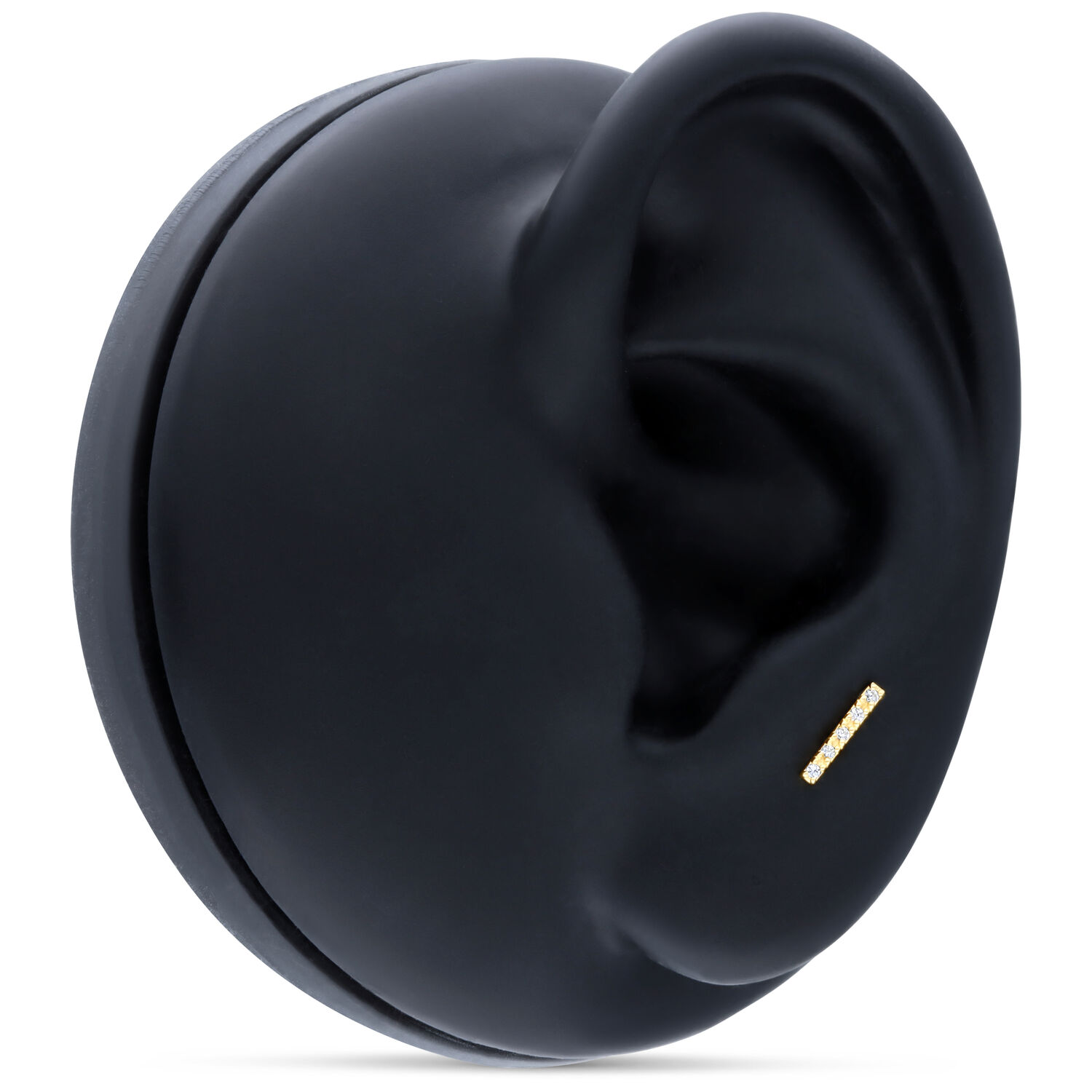 Barbell d'oreille en or 18K avec cristaux Barbell d'oreille en or 18K avec cinq cristaux clairs sur fond noir