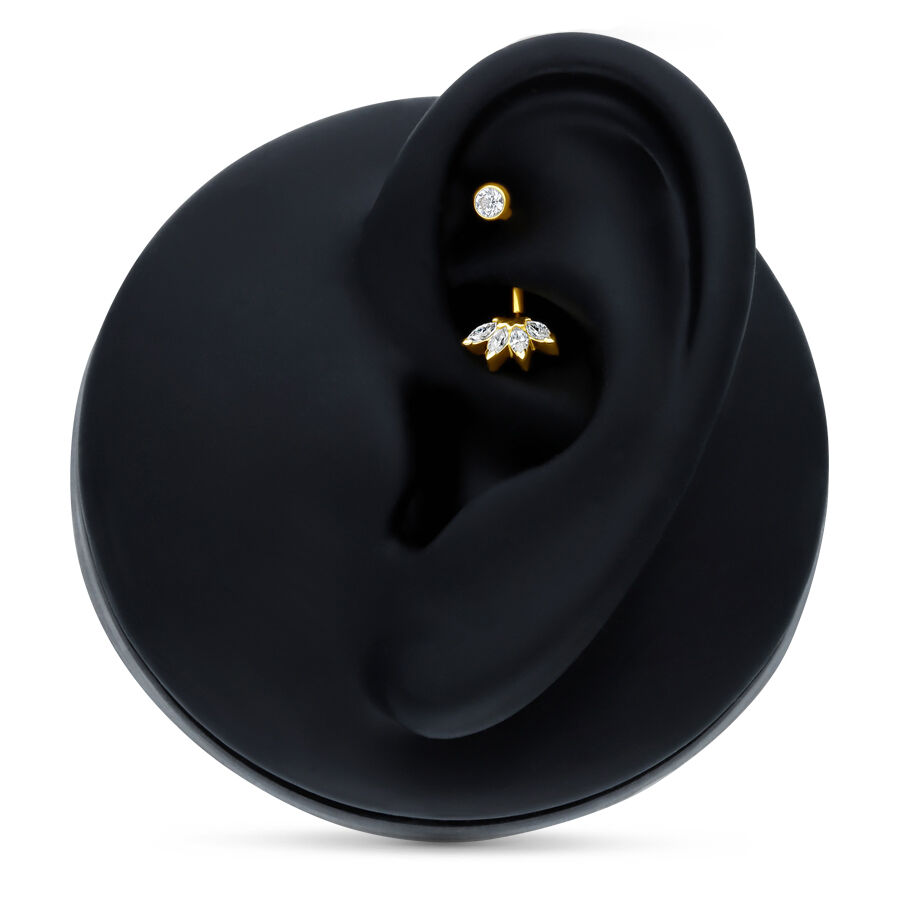 Microbananabell en or 18K avec cristal Lily Microbananabell en or avec pierres cristallines dans un présentoir d'oreille noir