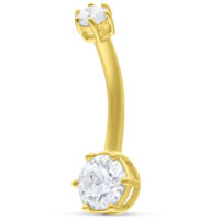 Bananabell en or 18K avec cristaux Bananabell en or 18K avec deux pierres cristallines sur fond blanc