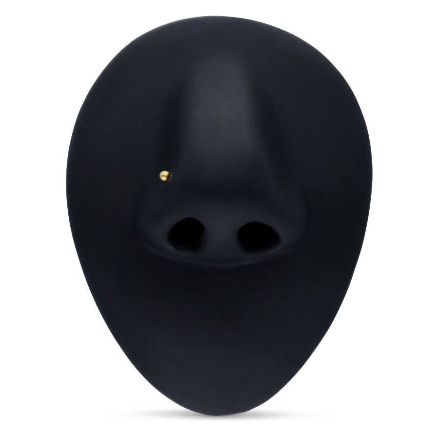 Clou de nez en or 18k sur présentoir noir Clou de nez en or 750 sur présentoir noir en forme de nez