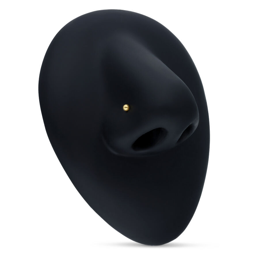 Clou de nez en or 18k sur fond noir Petit clou de nez en or 18k sur fond noir