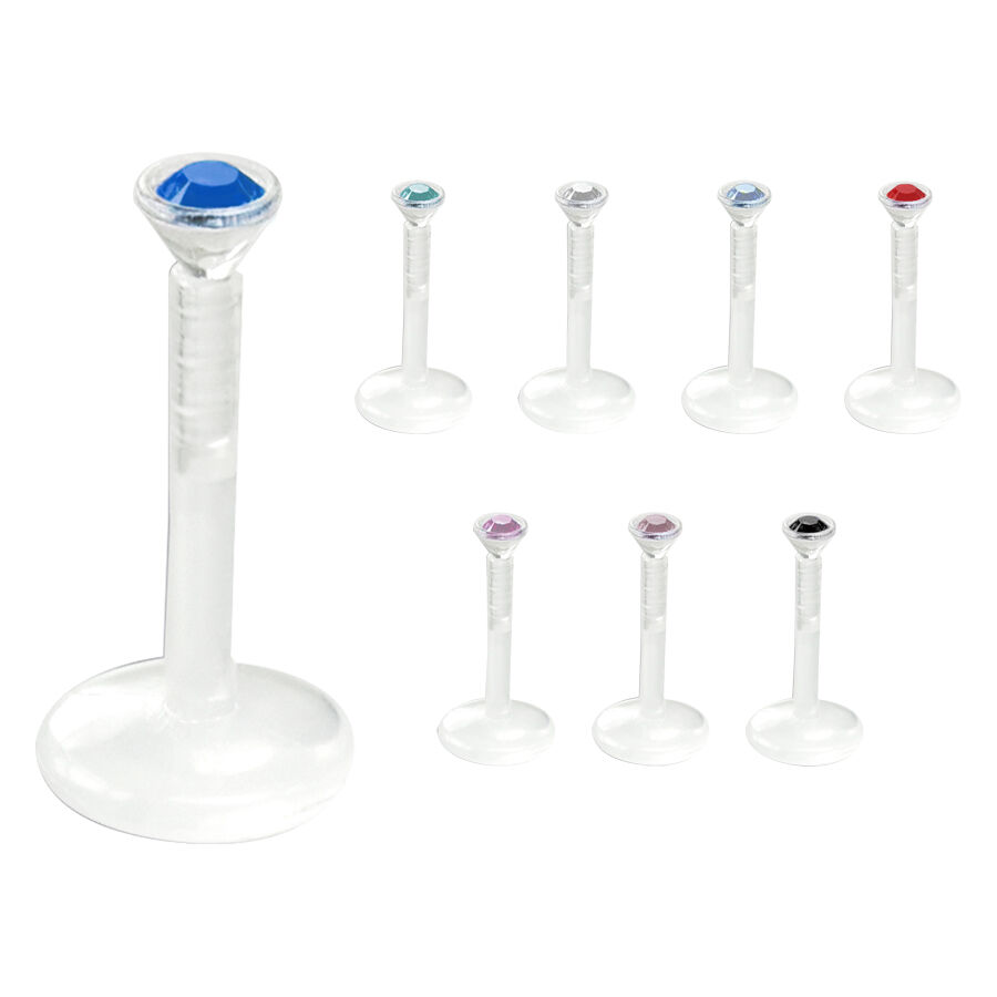 Labret transparent avec cristal décoratif Labret transparent avec cristaux colorés sur fond blanc