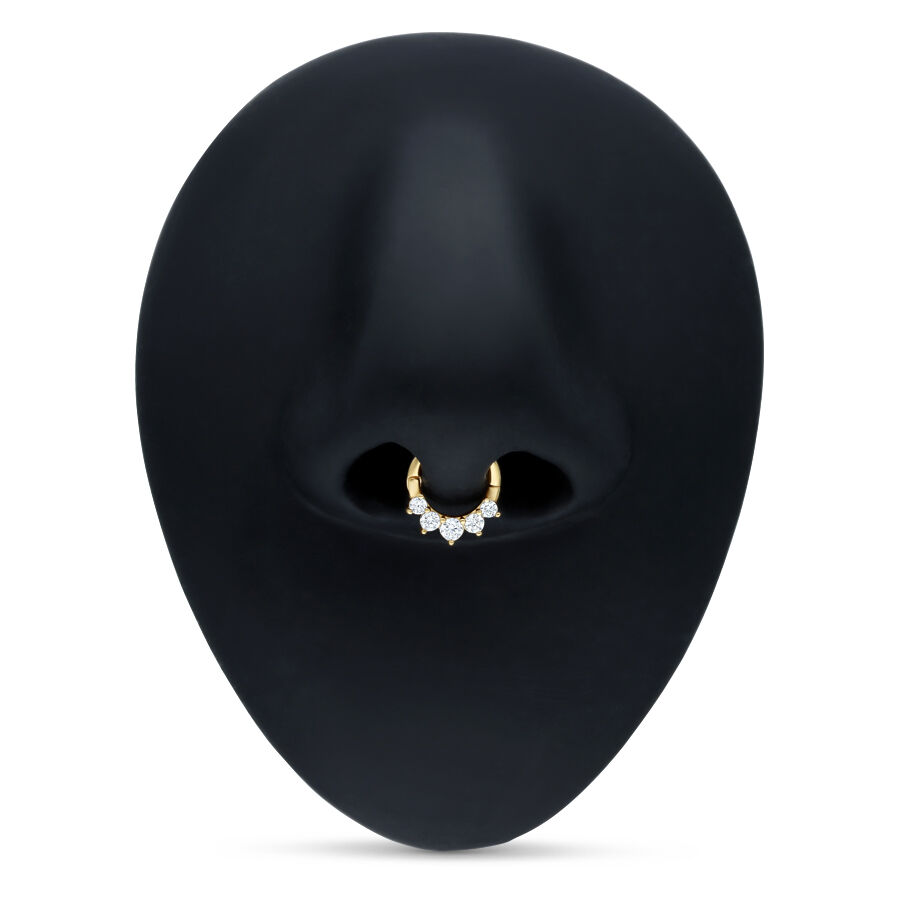 Clicker de septum en or 18K avec cristaux Clicker de septum doré avec cristaux clairs sur fond noir