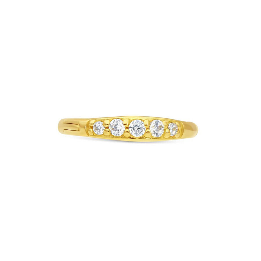 Anneau de piercing pavé en or 18K avec cristaux Anneau de piercing en or 18K avec cristaux clairs sur fond blanc