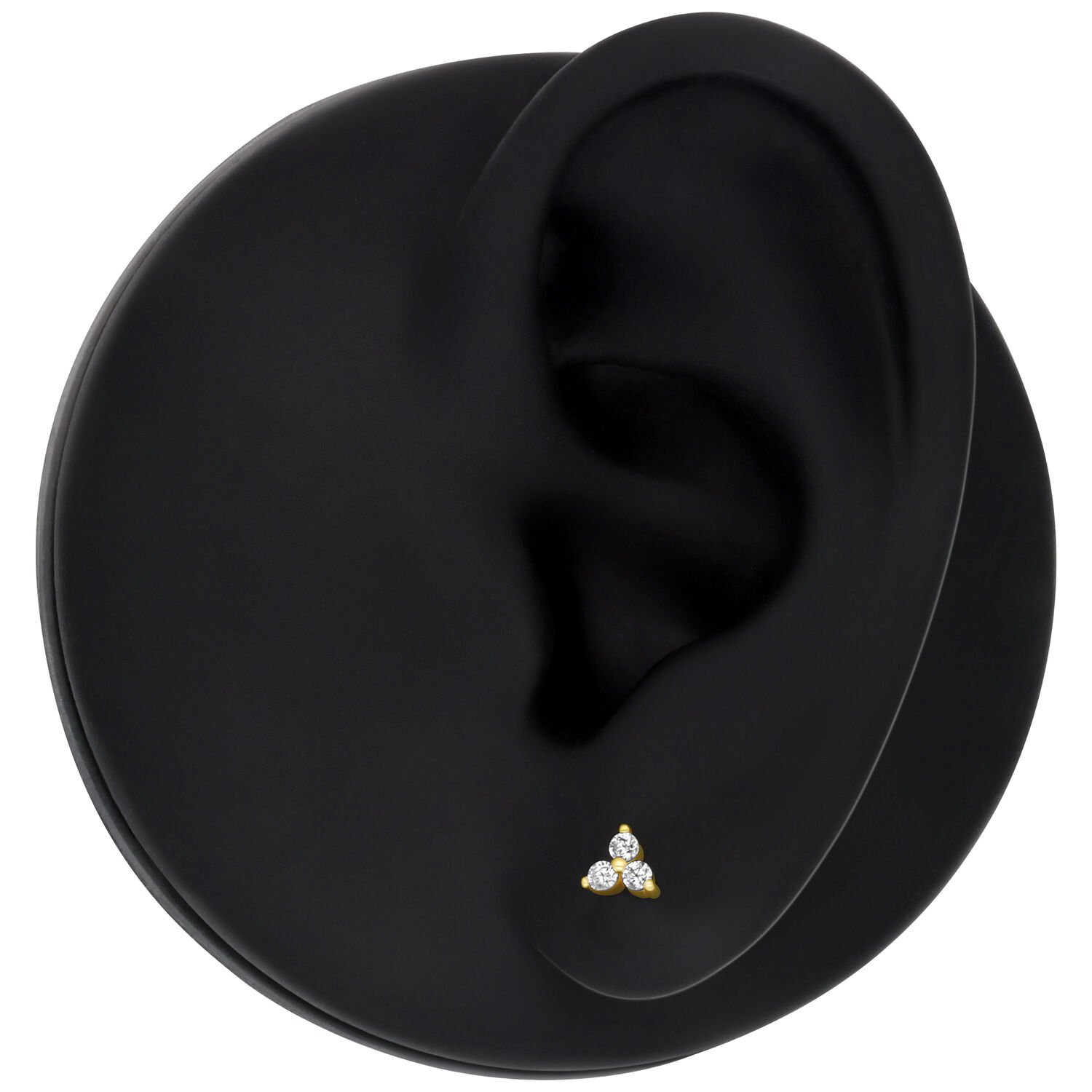Embout de piercing Trinity en or 14K Embout de piercing Trinity en or 14K avec cristaux clairs sur modèle d'oreille noire