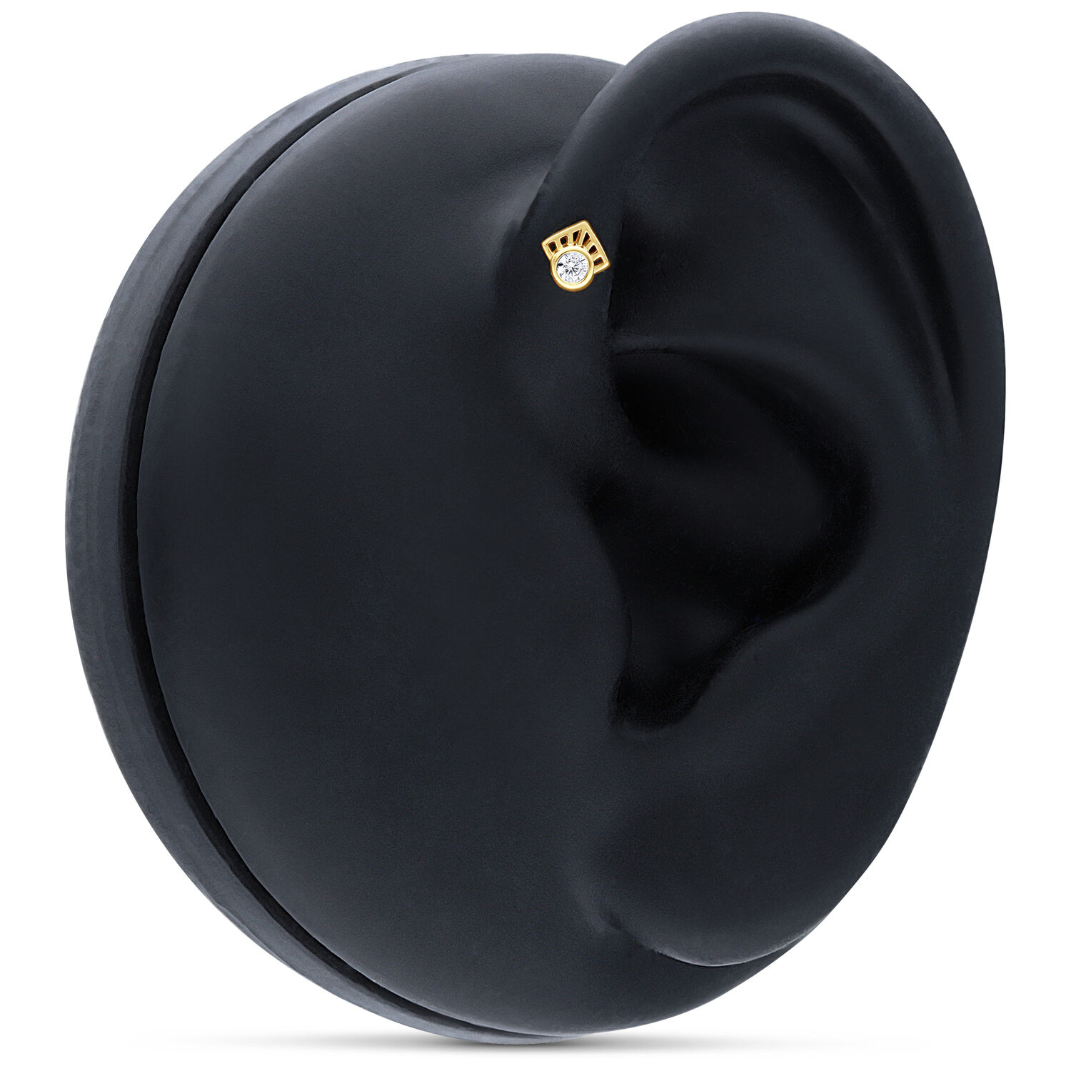 Embout de piercing en or 14K avec cristal Embout de piercing en or 14K avec cristal clair sur un modèle d'oreille noir