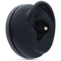 Embout fleur en or 14K avec cristaux sur présentoir noir pour oreille