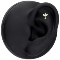 Embout Lotus en or 14K avec moissanite Embout Lotus en or avec moissanite sur présentoir noir pour oreille