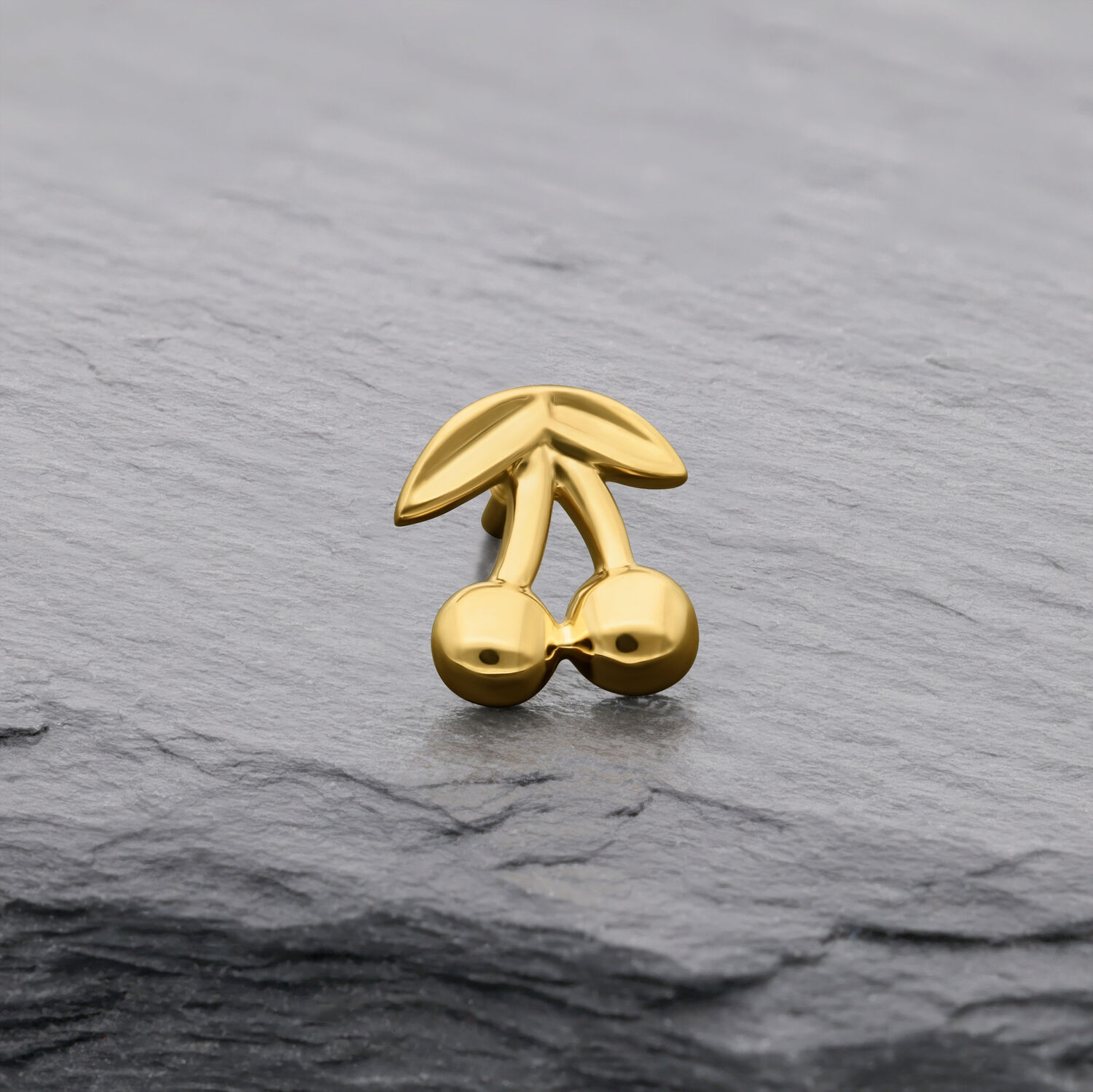 Embout Cerise en Or 14K pour Piercings Embout cerise en or 14K sur fond gris