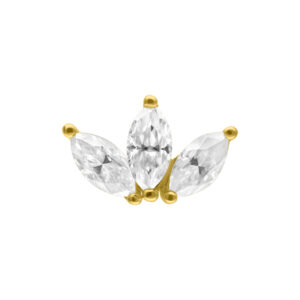 Embout en or en forme de lotus avec trois cristaux scintillants sur fond blanc