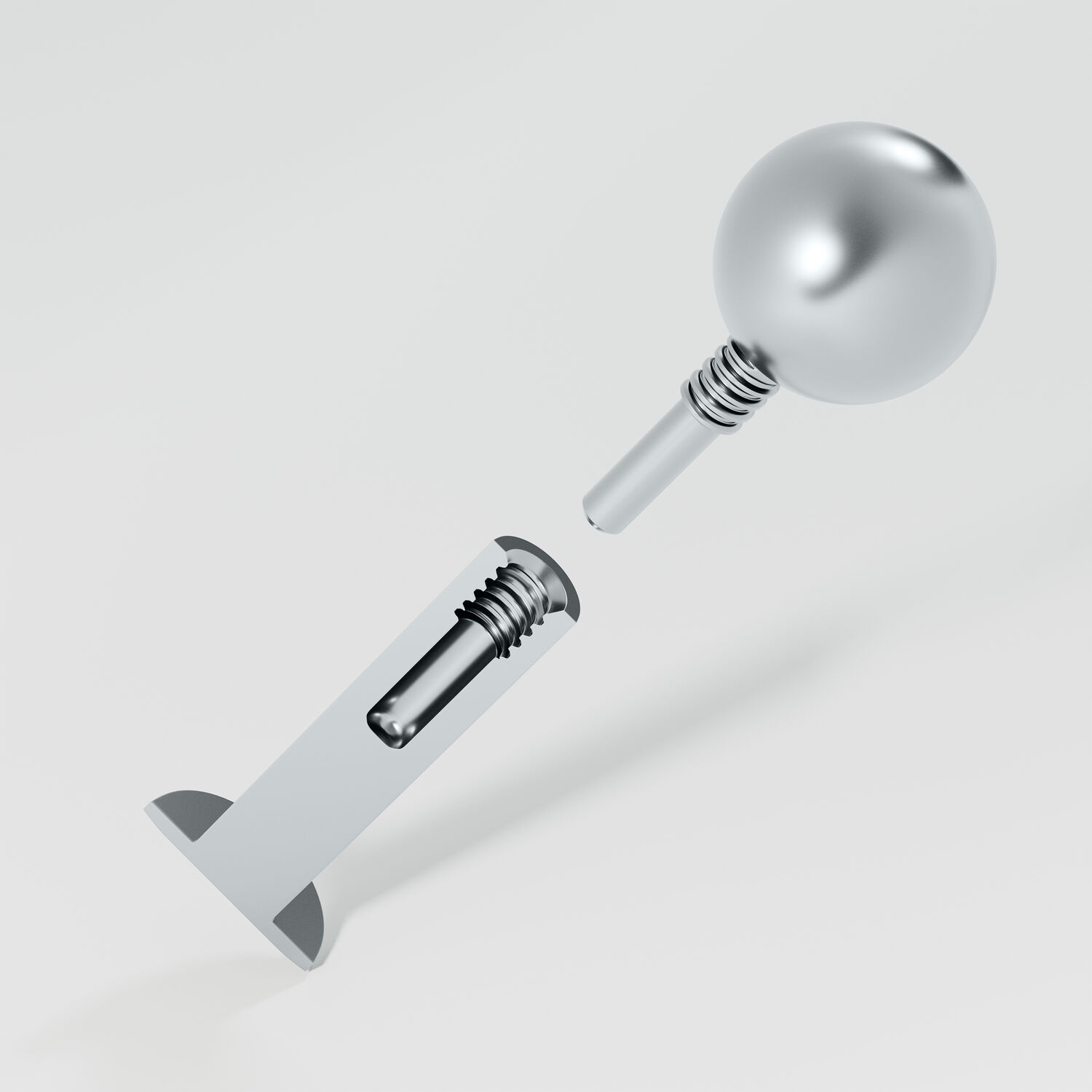 Labret en titane avec filetage interne en argent Labret en titane argenté avec filetage interne sur fond gris