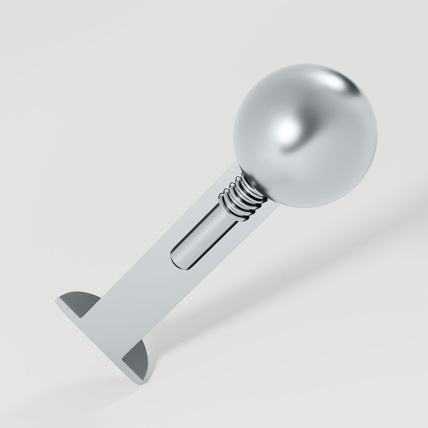 Labret en titane avec filetage interne, argent Labret en titane argenté avec filetage interne sur fond blanc
