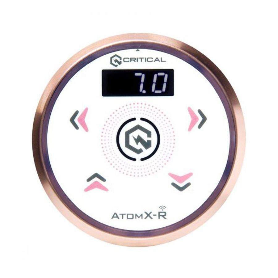 Bloc d'alimentation Critical Atomxr en or rose et blanc Bloc d'alimentation rond Critical Atomxr en or rose et blanc sur fond blanc