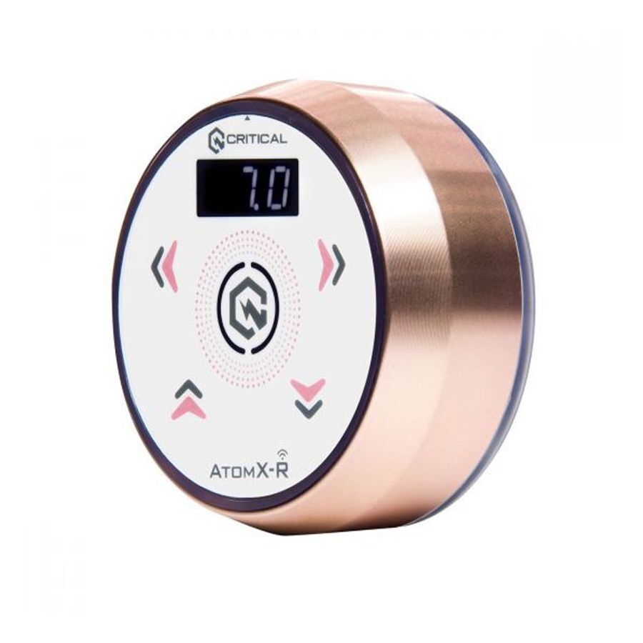 Critical Atomxr Alimentation Rosegold/Blanc Alimentation ronde en rosegold et blanc sur fond blanc