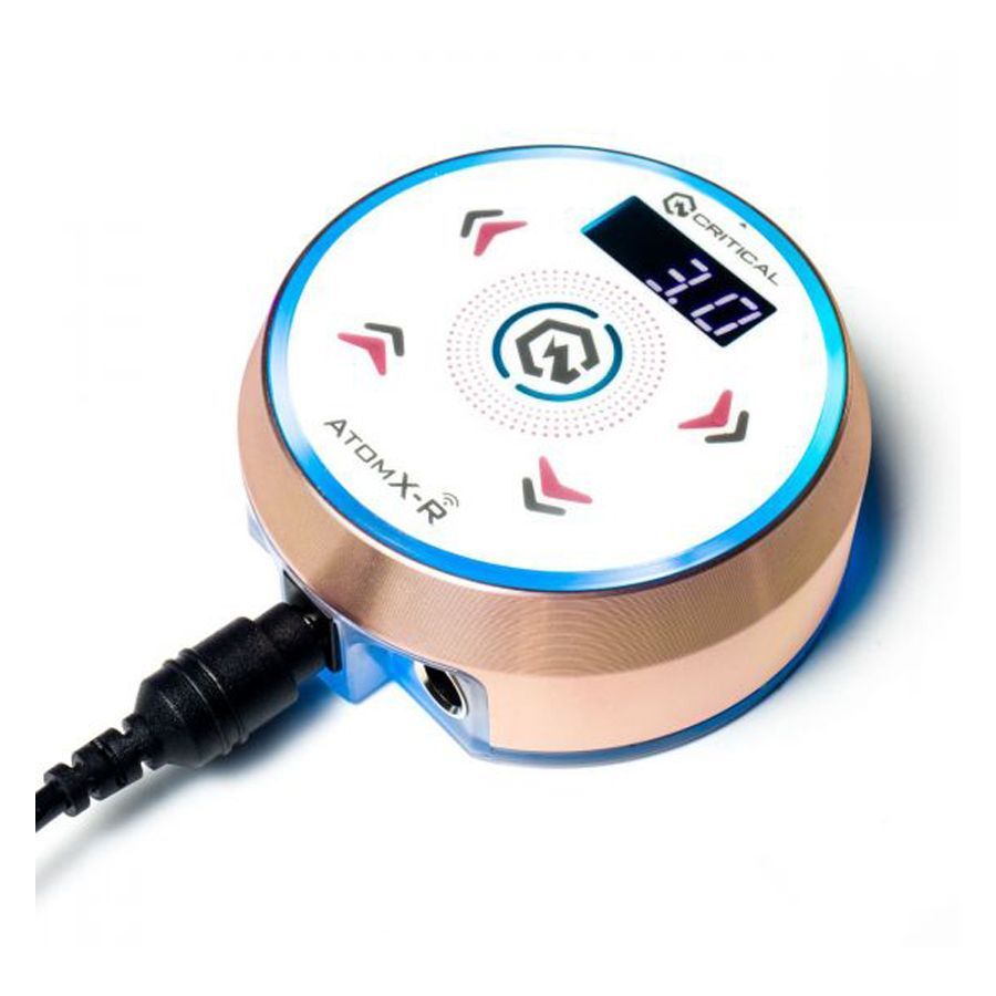 Critical Atomxr Alimentation Rosegold Alimentation ronde en rosegold et blanc sur fond blanc