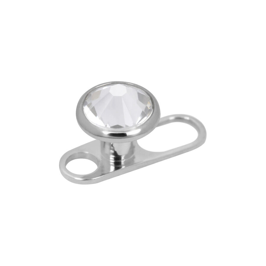 Ancrage dermal en titane avec cristal transparent Ancrage dermal en titane argenté avec cristal transparent sur fond blanc