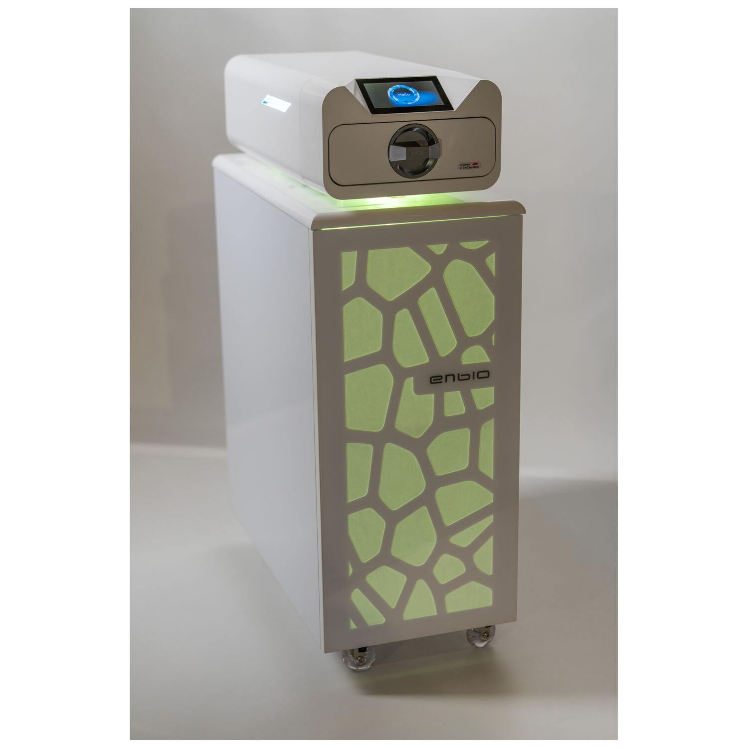 Enbio Trolley avec éclairage LED Trolley Enbio blanc avec motif éclairé en vert et roulettes sur fond gris