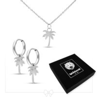 Collier et boucles d'oreilles palmiers en argent sur fond blanc avec emballage Wildcat