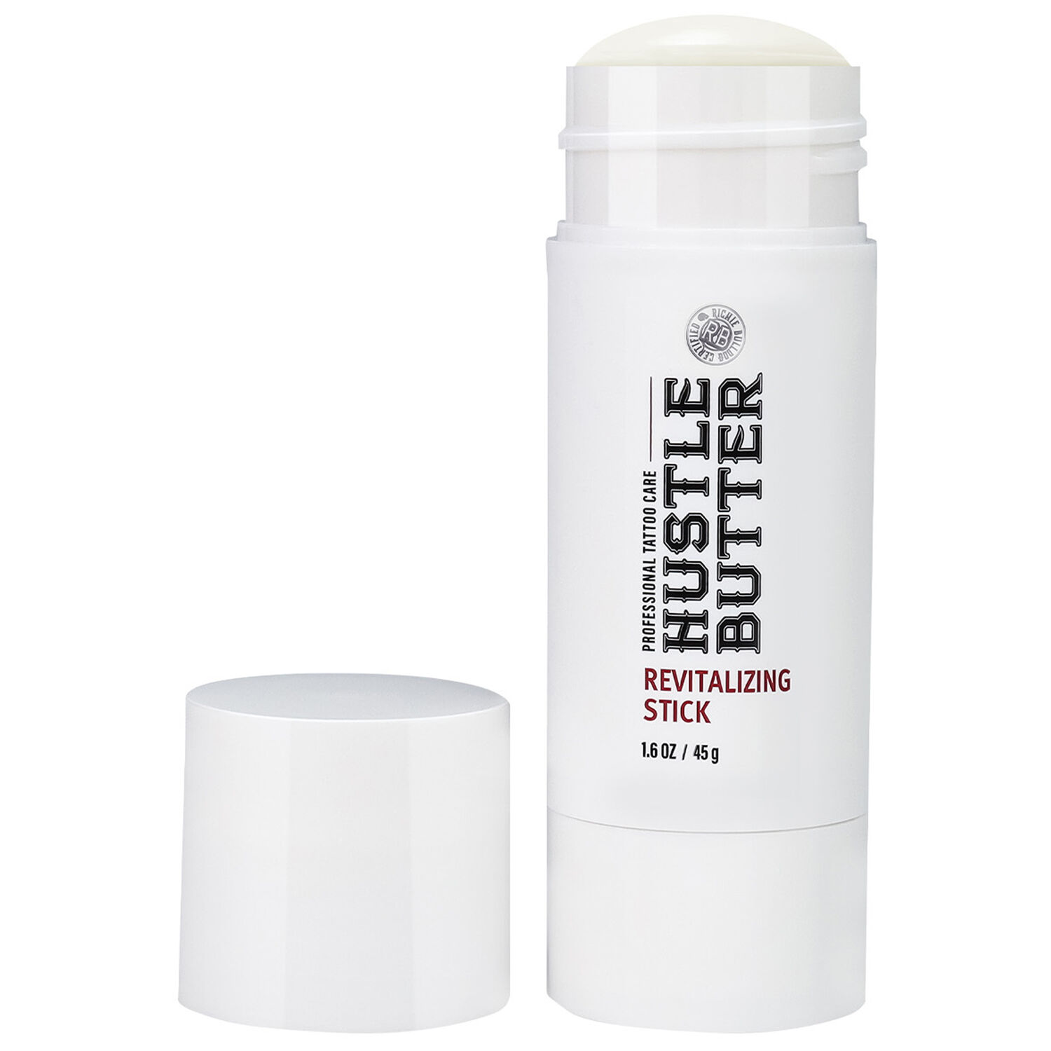 Hustle Butter Revitalizing Stick sur fond blanc avec le couvercle retiré