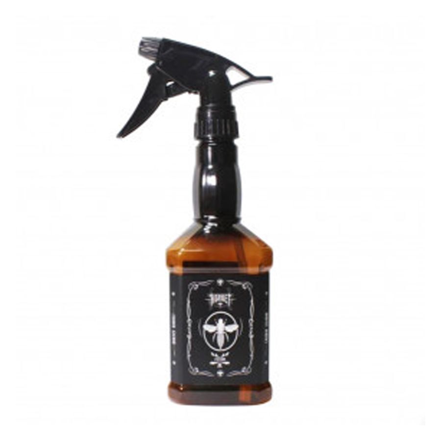 Bouteille vaporisateur whisky marron 550ml Bouteille vaporisateur marron avec tête de pulvérisation noire sur fond blanc