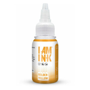 Encre de tatouage dans un flacon orange avec un bouchon blanc sur fond blanc