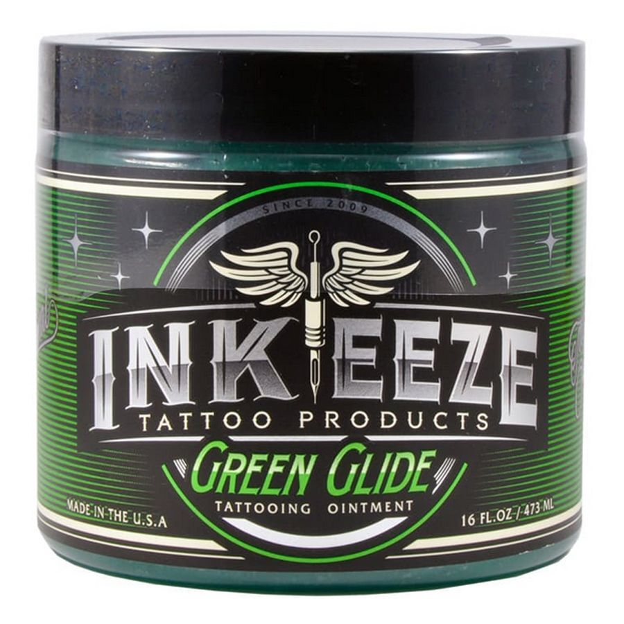 Green Glide crème tatouage 473ml de Ink Eeze Crème tatouage verte dans une boîte ronde avec logo argenté sur fond blanc