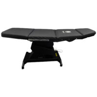 Chaise de tatouage et piercing noire Lemi Chaise noire Lemi en cuir synthétique et aluminium sur fond blanc