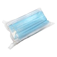 Masques faciaux jetables bleus paquet de 50 Pile de masques faciaux jetables bleus dans un emballage transparent