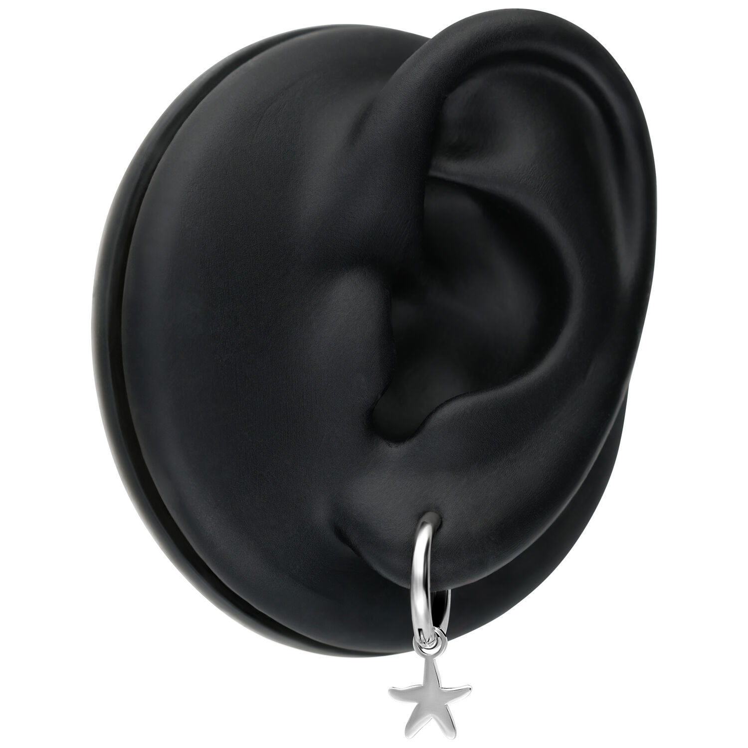 Mini boucles d'oreilles étoile de mer argentées sur un mannequin d'oreille noir
