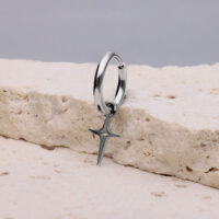 Mini Boucles d'Oreilles Étoile Polaire Argent Boucle d'oreille en argent avec pendentif en forme d'étoile polaire sur pierre claire