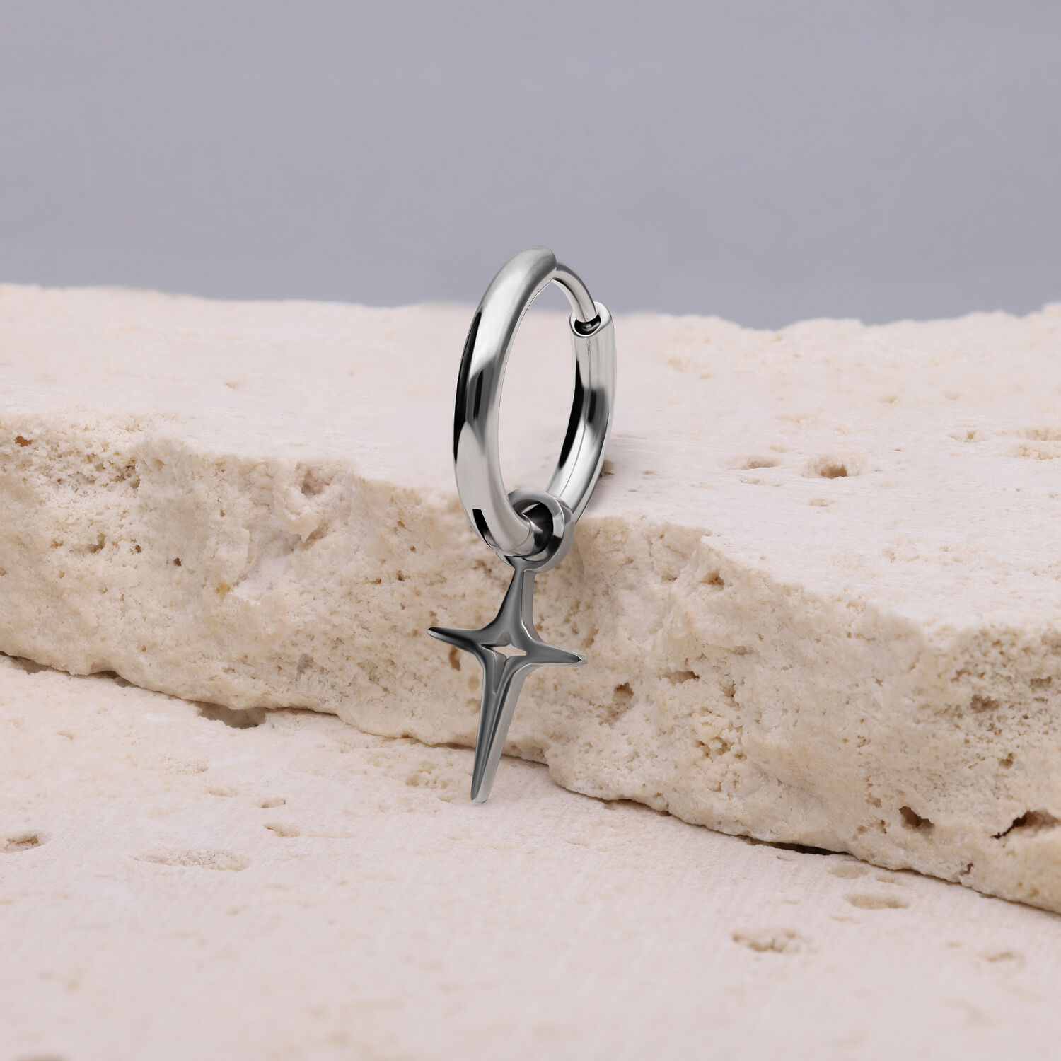 Mini Boucles d'Oreilles Étoile Polaire Argent Boucle d'oreille en argent avec pendentif en forme d'étoile polaire sur pierre claire