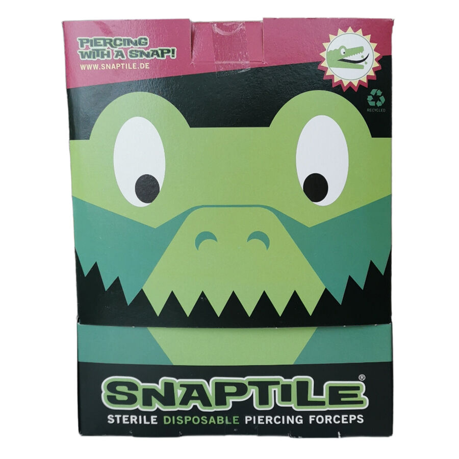 Pince à usage unique stérile en emballage noir Emballage vert avec design crocodile, inscription 'Snaptile' et mention de recyclage