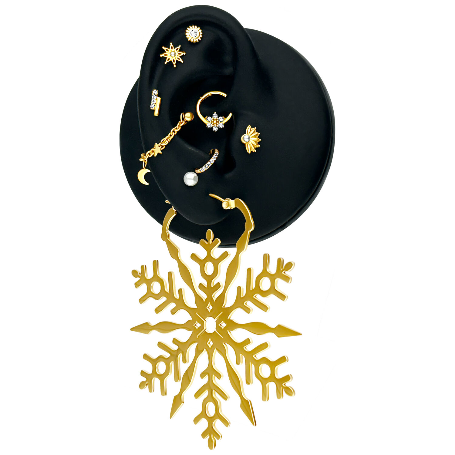 Chaîne de piercing en or avec motifs de lune et d'étoiles sur présentoir noir
