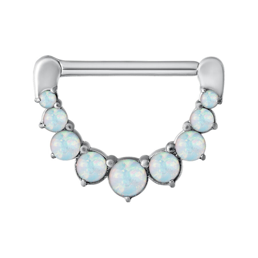 Clicker de mamelon en argent avec opales Clicker de mamelon argenté avec sept opales synthétiques sur fond blanc