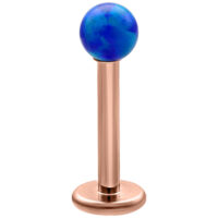 Labret en opale bleu foncé 5mm or rose Labret en opale bleu foncé sur tige en titane or rose, fond de studio