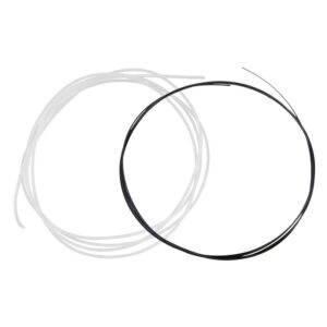 Barre de piercing PTFE noire et claire sur fond blanc