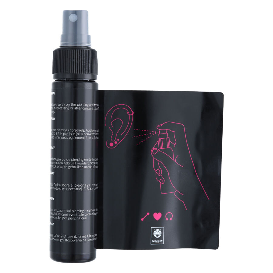 Wildcat Piercingspray Set 60ml avec guide Flacon de piercingspray et guide avec dessin sur fond blanc