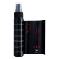 Spray pour piercing Set 2x 60ml Noir Flacon de spray pour piercing noir et emballage sur fond blanc