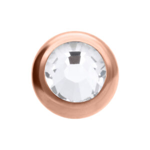 Embout de piercing rond en rose doré avec cristal clair sur fond blanc