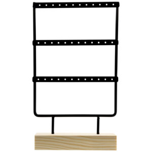 Support en métal noir sur socle en bois clair, avec trous pour boucles d'oreilles