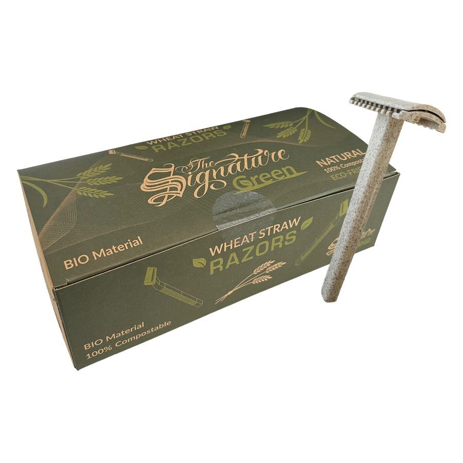 Rasoir jetable biodégradable en paille de blé Rasoir jetable en paille de blé à côté d'une boîte verte avec l'inscription 'The Signature Green', sur fond blanc